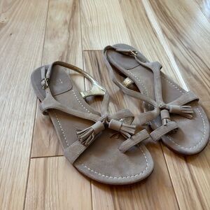 Stuart Weitzman Suede Tan Tassel Accent Flat Sandals